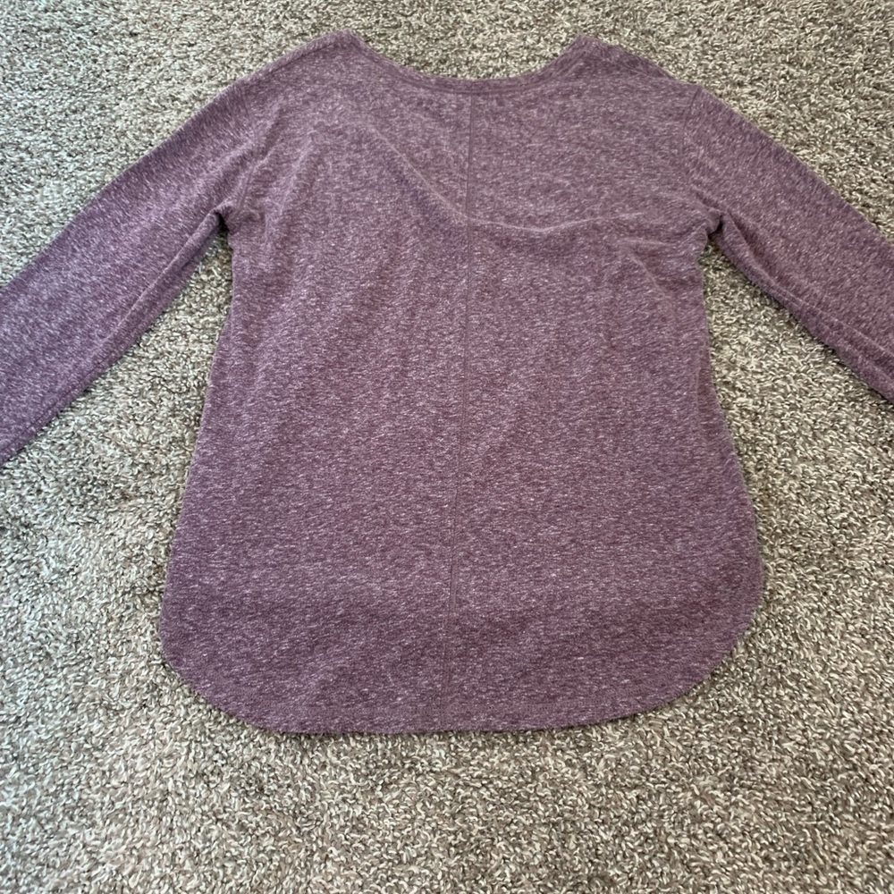Long sleeve with colorful roses on it.